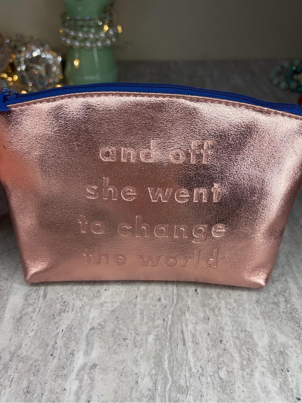 Metalluc Ipsy makeup cosmetic bag filled with wearable earrings